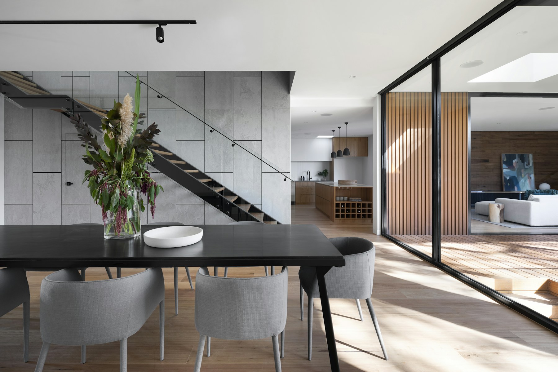 Contemporary open plan interior with architectural timber details